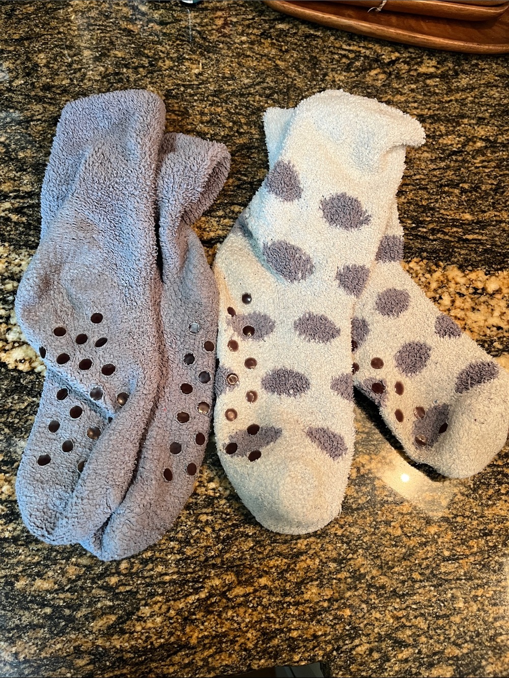 Two pair of grip bottom, fuzzy socks, shoe size 6–8